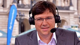 Sportreporter Florian Naß Sportreporter Florian Naß © Hessischer Rundfunk Foto: Gisela Dienersberger