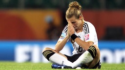 Frust bei der deutschen Nationalspielerin Simone Laudehr © picture-alliance/sampics 
