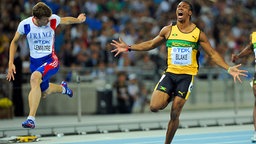 Christophe Lemaitre (l.) wird bei der Leichtathletik-Weltmeisterschaft 2011 in Daegu Vierter über 100 Meter. © picture alliance / DPPI Foto: FRANCK FAUGERE