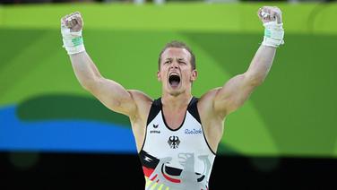 Der deutsche Turner Fabian Hambüchen jubelt © dpa - Bildfunk Foto: Soeren Stache
