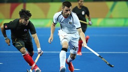 Martin Zwicker (r.) aus der deutschen Hockey-Nationalmannschaft © picture alliance / dpa Foto: Friso Gentsch