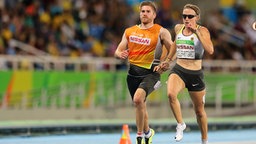 Die deutsche Sprinterin Katrin Müller-Rottgardt (r.) und ihr Begleitläufer Sebastian Fricke © imago/Beautiful Sports 