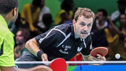 Tischtennisspieler Timo Boll bei einem Spiel bei den Olympischen Spielen in Rio. © dpa picture alliance Foto: Erik S. Lesser