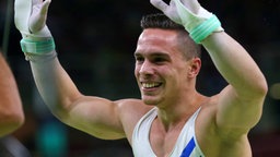 Der griechische Turner Eleftherios Petrounias © dpa - Bildfunk Foto: How Hwee Young